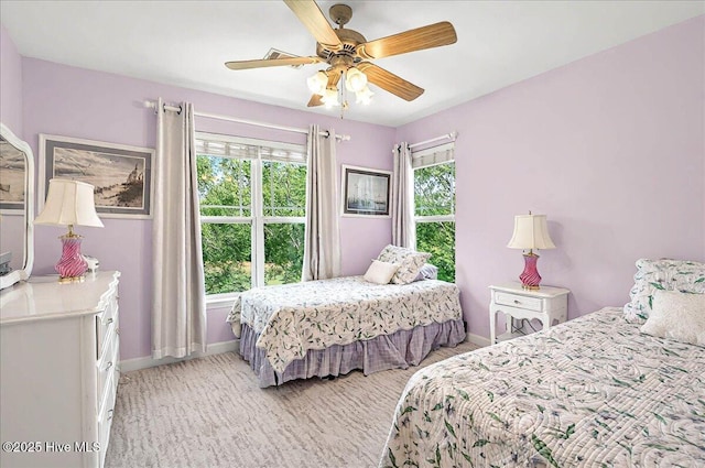 260 S Crow Creek Dr NW Lot 18, Calabash, NC 28467 - bedroom with baseboards, a ceiling fan, and multiple windows