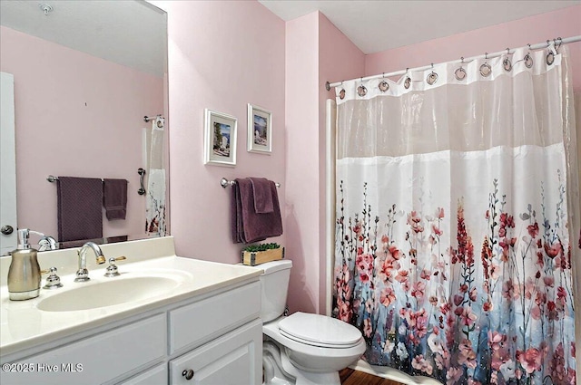 260 S Crow Creek Dr NW Lot 18, Calabash, NC 28467 - full bath featuring vanity, toilet, and a shower with shower curtain