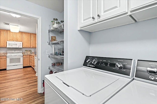 260 S Crow Creek Dr NW Lot 18, Calabash, NC 28467 - washroom featuring visible vents, washer and clothes dryer, cabinet space, and light wood finished floors