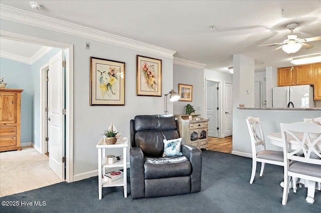 260 S Crow Creek Dr NW Lot 18, Calabash, NC 28467 - living room featuring baseboards, ornamental molding, carpet, and ceiling fan