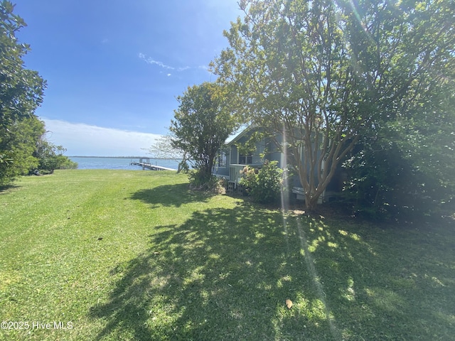 view of yard with a water view