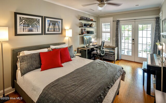 2111 Gibson Ave, Wilmington, NC 28403 - bedroom featuring crown molding, access to exterior, french doors, and wood finished floors