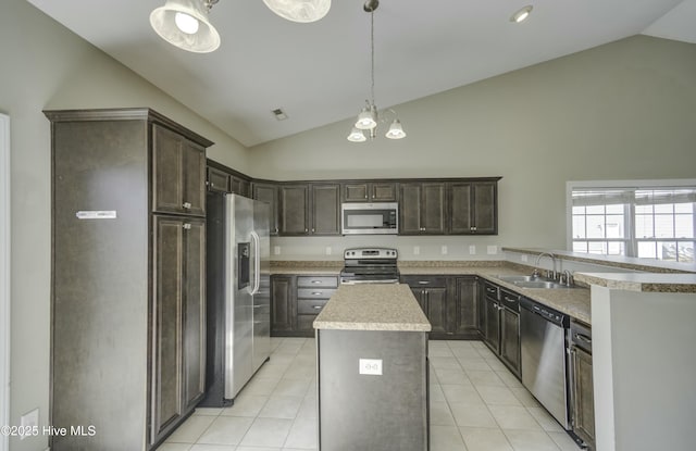 kitchen with dark brown cabinetry, high vaulted ceiling, stainless steel appliances, and a sink