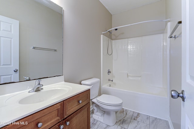 full bathroom featuring shower / bath combination, vanity, marble finish floor, and toilet