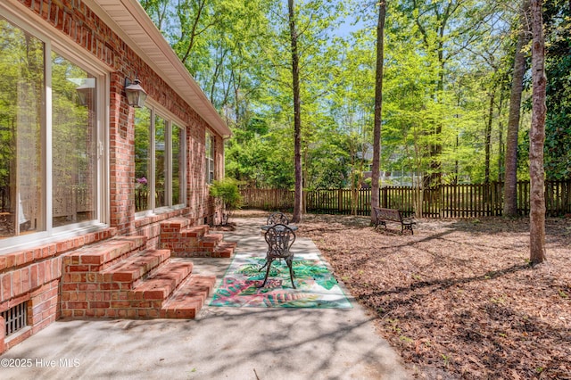 view of patio with a fenced backyard