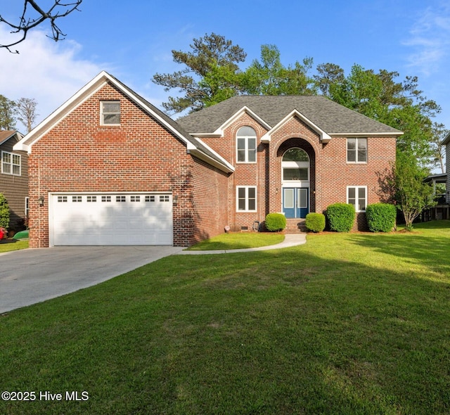 2417 Turtle Bay Dr, New Bern, NC 28562 - traditional-style house featuring concrete driveway, brick siding, a front yard, and a garage