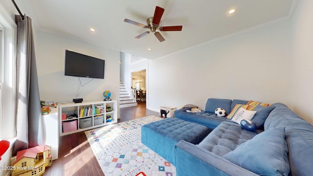 2417 Turtle Bay Dr, New Bern, NC 28562 - living room with a ceiling fan, ornamental molding, wood finished floors, and stairway