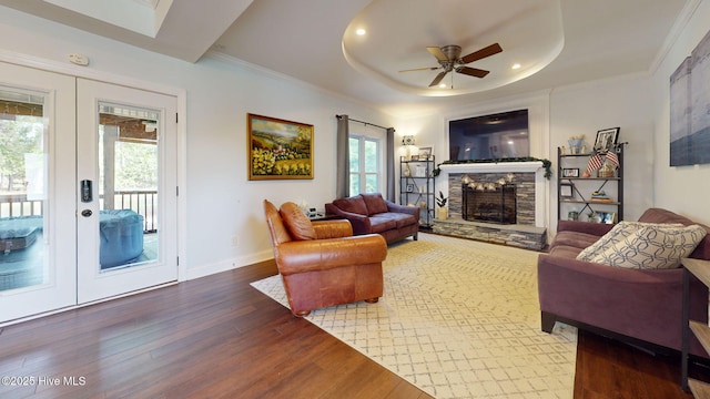 2417 Turtle Bay Dr, New Bern, NC 28562 - living area featuring a raised ceiling, a ceiling fan, french doors, and wood finished floors