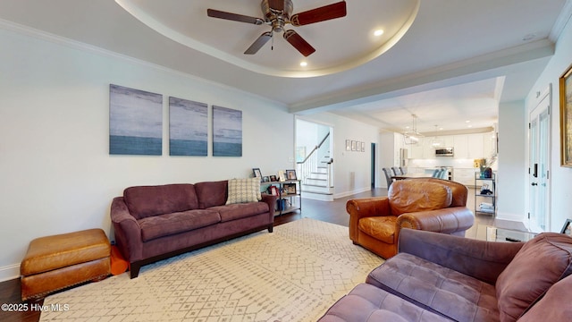 2417 Turtle Bay Dr, New Bern, NC 28562 - living room with baseboards, a ceiling fan, wood finished floors, and stairway