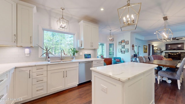 2417 Turtle Bay Dr, New Bern, NC 28562 - kitchen featuring a sink, dishwasher, a chandelier, open floor plan, and tasteful backsplash