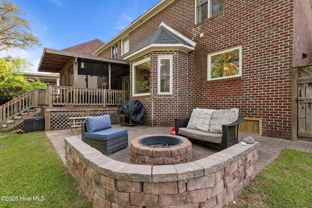 2417 Turtle Bay Dr, New Bern, NC 28562 - view of patio featuring grilling area, a wooden deck, a sunroom, an outdoor living space with a fire pit, and stairs