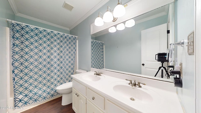2417 Turtle Bay Dr, New Bern, NC 28562 - full bath featuring toilet, visible vents, ornamental molding, and a sink