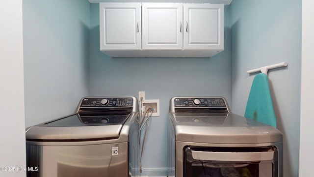2417 Turtle Bay Dr, New Bern, NC 28562 - laundry room with washer and clothes dryer and cabinet space