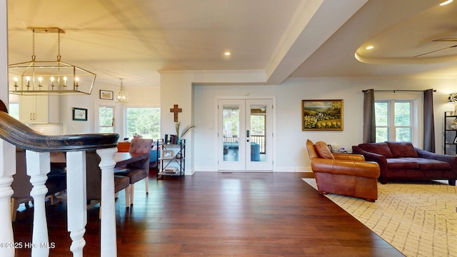 2417 Turtle Bay Dr, New Bern, NC 28562 - living area with crown molding, hardwood / wood-style floors, baseboards, french doors, and a notable chandelier