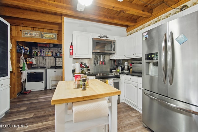 167 Puddin Ridge Rd, Moyock, NC 27958 - kitchen featuring appliances with stainless steel finishes, separate washer and dryer, wooden counters, wood ceiling, and beam ceiling