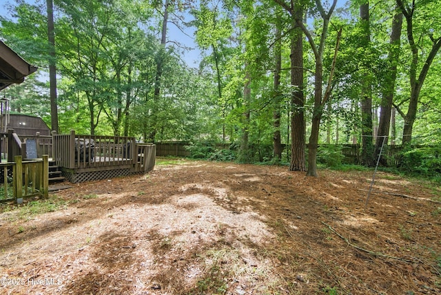 167 Puddin Ridge Rd, Moyock, NC 27958 - fenced backyard featuring a wooden deck