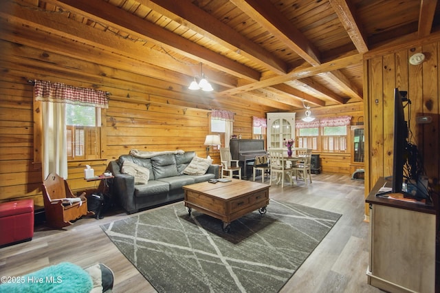 167 Puddin Ridge Rd, Moyock, NC 27958 - living room with wooden walls, beam ceiling, wooden ceiling, and wood finished floors