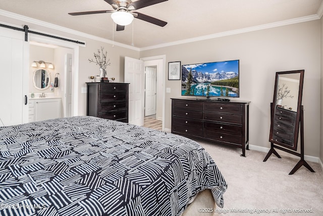 869 Driftwood Dr, Greenville, NC 27858 - bedroom featuring crown molding, light colored carpet, baseboards, a barn door, and ceiling fan
