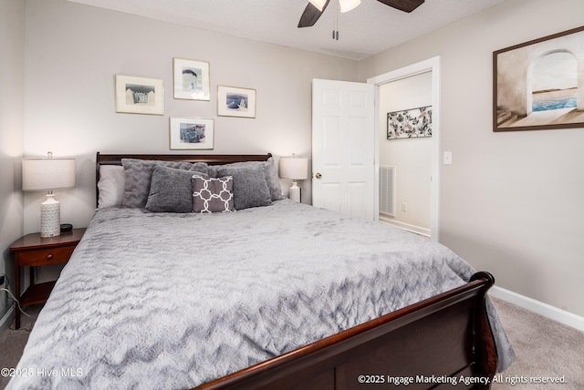 869 Driftwood Dr, Greenville, NC 27858 - bedroom featuring carpet, baseboards, and a ceiling fan