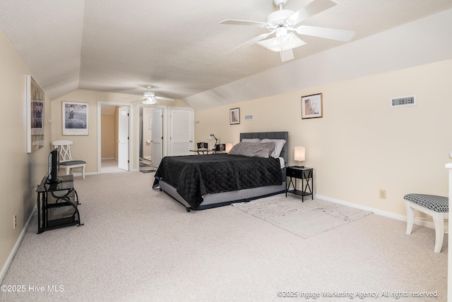 869 Driftwood Dr, Greenville, NC 27858 - carpeted bedroom with vaulted ceiling, a textured ceiling, baseboards, and ceiling fan
