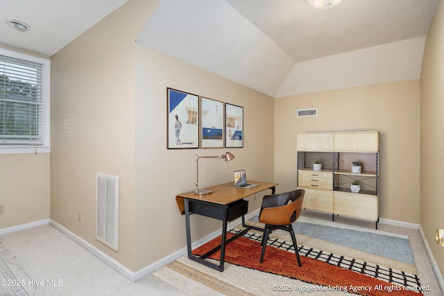 869 Driftwood Dr, Greenville, NC 27858 - home office with baseboards, vaulted ceiling, and light colored carpet