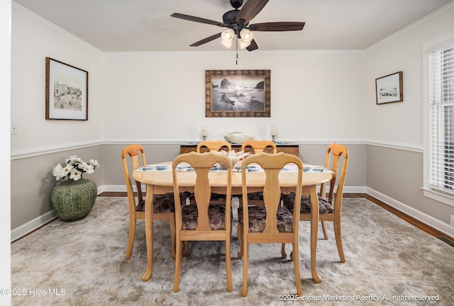 869 Driftwood Dr, Greenville, NC 27858 - dining area featuring crown molding, ceiling fan, and baseboards