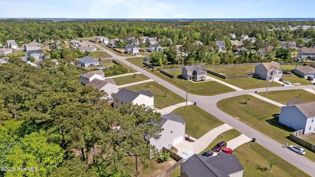 aerial view with a view of trees and a residential view