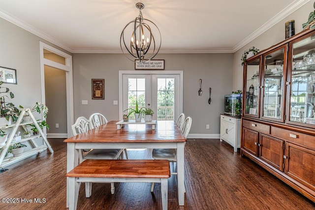 22 Calhoun Ln, Pinehurst, NC 28374 - dining room with french doors, a chandelier, dark wood-style floors, baseboards, and crown molding