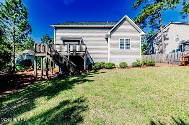22 Calhoun Ln, Pinehurst, NC 28374 - back of house with stairway and a deck