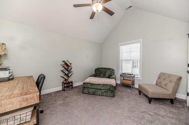 carpeted office with vaulted ceiling, baseboards, a ceiling fan, and visible vents