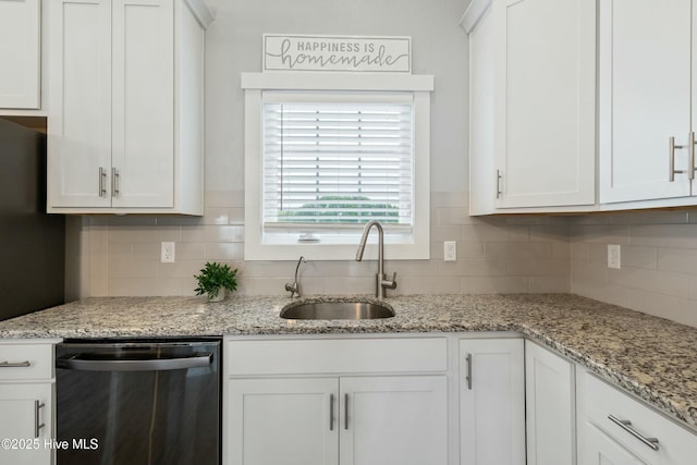 144 Pelican Pointe Dr, Elizabeth City, NC 27909 - kitchen featuring a sink, dishwasher, white cabinets, and backsplash