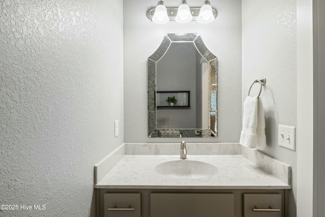 144 Pelican Pointe Dr, Elizabeth City, NC 27909 - bathroom featuring a textured wall and vanity