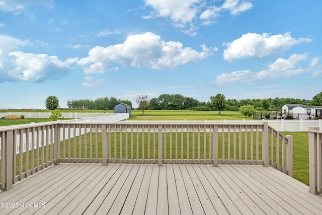 144 Pelican Pointe Dr, Elizabeth City, NC 27909 - wooden deck featuring a yard, a storage unit, and a fenced backyard