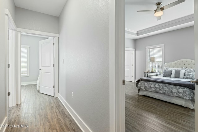144 Pelican Pointe Dr, Elizabeth City, NC 27909 - hallway with a textured wall, wood finished floors, and baseboards