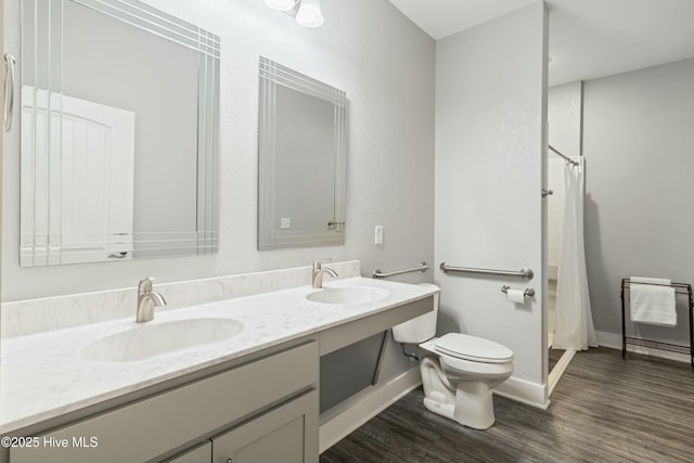 144 Pelican Pointe Dr, Elizabeth City, NC 27909 - full bathroom with toilet, a sink, wood finished floors, and baseboards