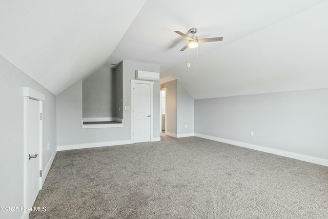 144 Pelican Pointe Dr, Elizabeth City, NC 27909 - additional living space with carpet flooring, baseboards, an AC wall unit, vaulted ceiling, and a ceiling fan