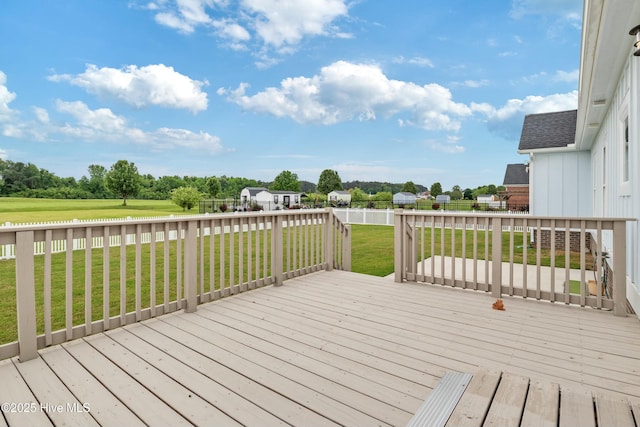 144 Pelican Pointe Dr, Elizabeth City, NC 27909 - wooden deck with a fenced backyard and a lawn