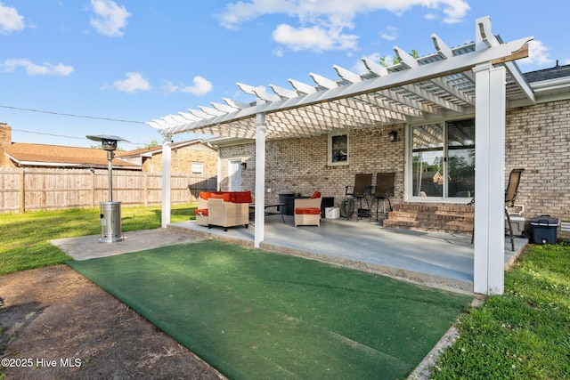 view of patio featuring a pergola, fence, and an outdoor hangout area