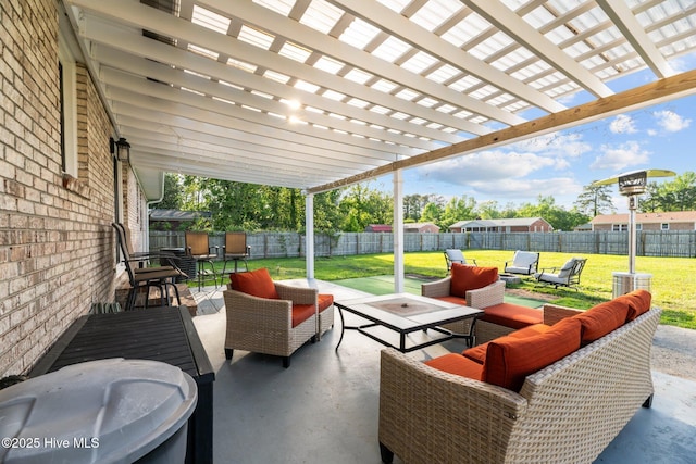 view of patio featuring a fenced backyard, a pergola, and an outdoor living space