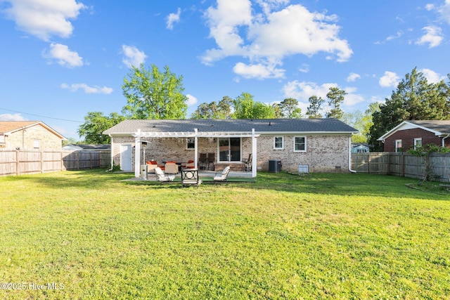 back of property with cooling unit, a patio, a fenced backyard, brick siding, and a lawn