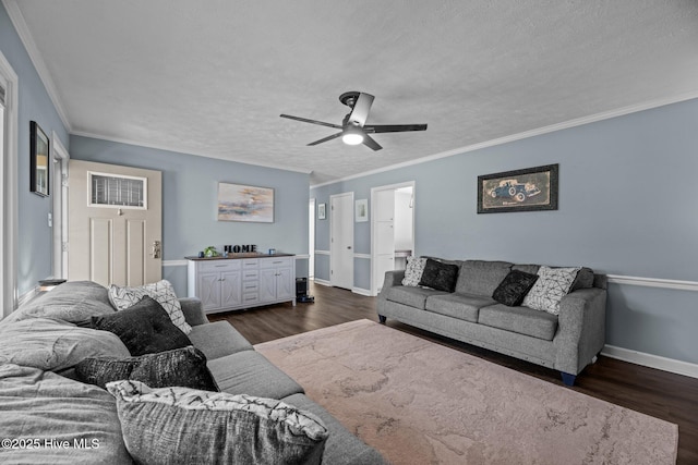 living room with baseboards, a ceiling fan, a textured ceiling, and dark wood-style floors