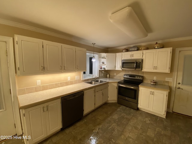 129 Cape Fear Dr, Southport, NC 28461 - kitchen featuring stainless steel appliances, a sink, white cabinetry, light countertops, and crown molding