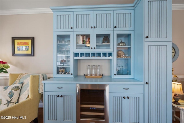 1 Gatha Ln, Ocean Isle Beach, NC 28469 - bar with beverage cooler, ornamental molding, and a dry bar