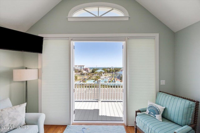 1 Gatha Ln, Ocean Isle Beach, NC 28469 - doorway to outside featuring wood finished floors and vaulted ceiling