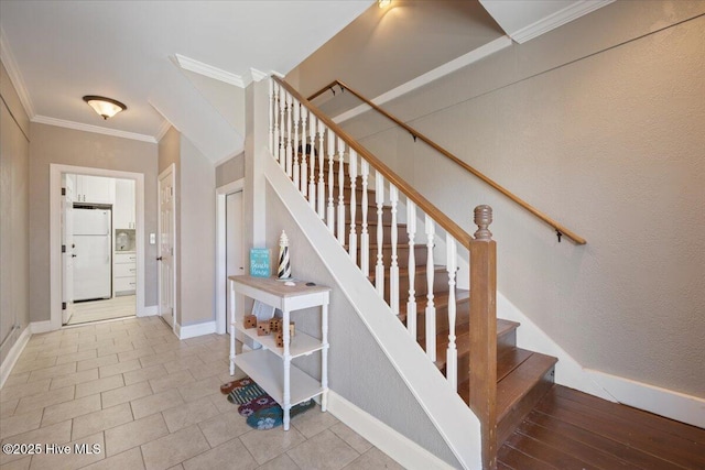 1 Gatha Ln, Ocean Isle Beach, NC 28469 - stairs with crown molding, baseboards, and tile patterned floors