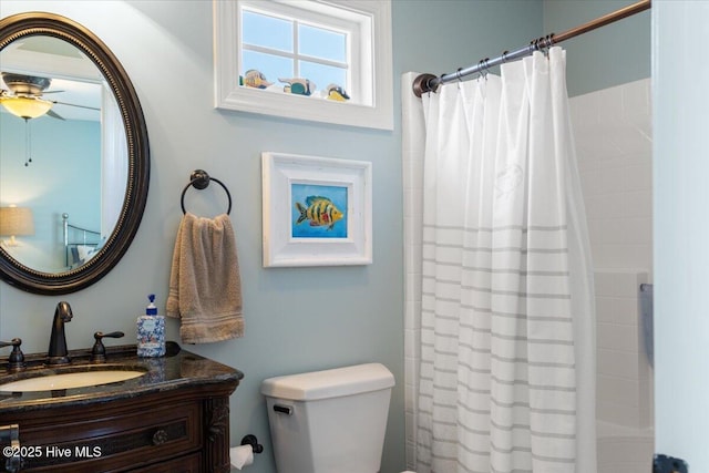 1 Gatha Ln, Ocean Isle Beach, NC 28469 - full bath featuring vanity, a ceiling fan, toilet, and a shower with curtain
