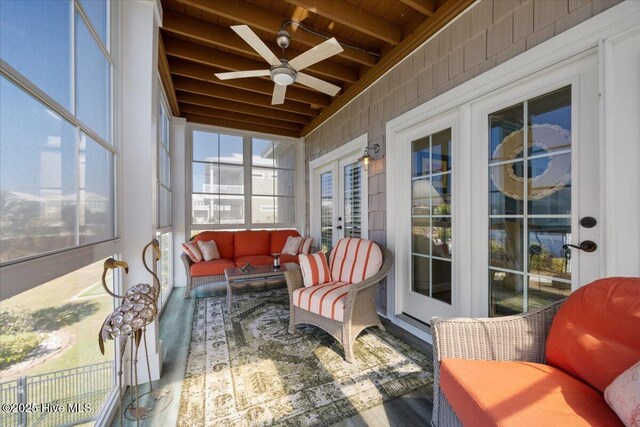 1 Gatha Ln, Ocean Isle Beach, NC 28469 - sunroom / solarium featuring wood ceiling, french doors, a ceiling fan, wood finished floors, and vaulted ceiling with beams