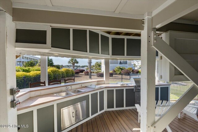 1 Gatha Ln, Ocean Isle Beach, NC 28469 - exterior space featuring fence, a sink, outdoor wet bar, and area for grilling