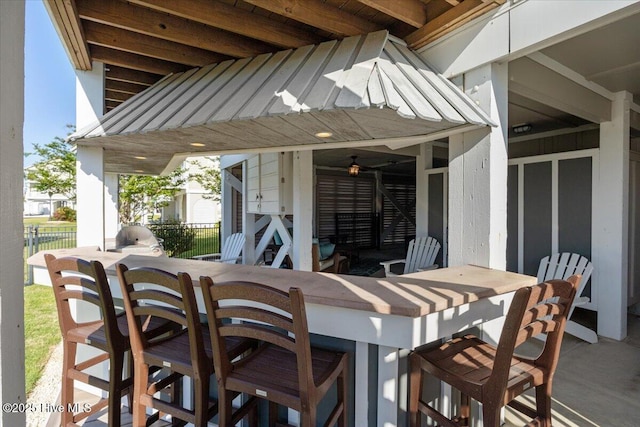 1 Gatha Ln, Ocean Isle Beach, NC 28469 - view of patio with fence and outdoor dry bar