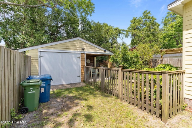 view of shed featuring a fenced backyard